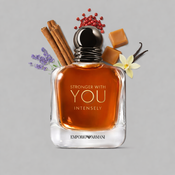 Perfume bottle labeled 'Stronger with You Intensely' by Emporio Armani with spices and flowers on a gray background