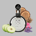 Lattafa Fakhar Men Perfume bottle with decorative elements on a gray background